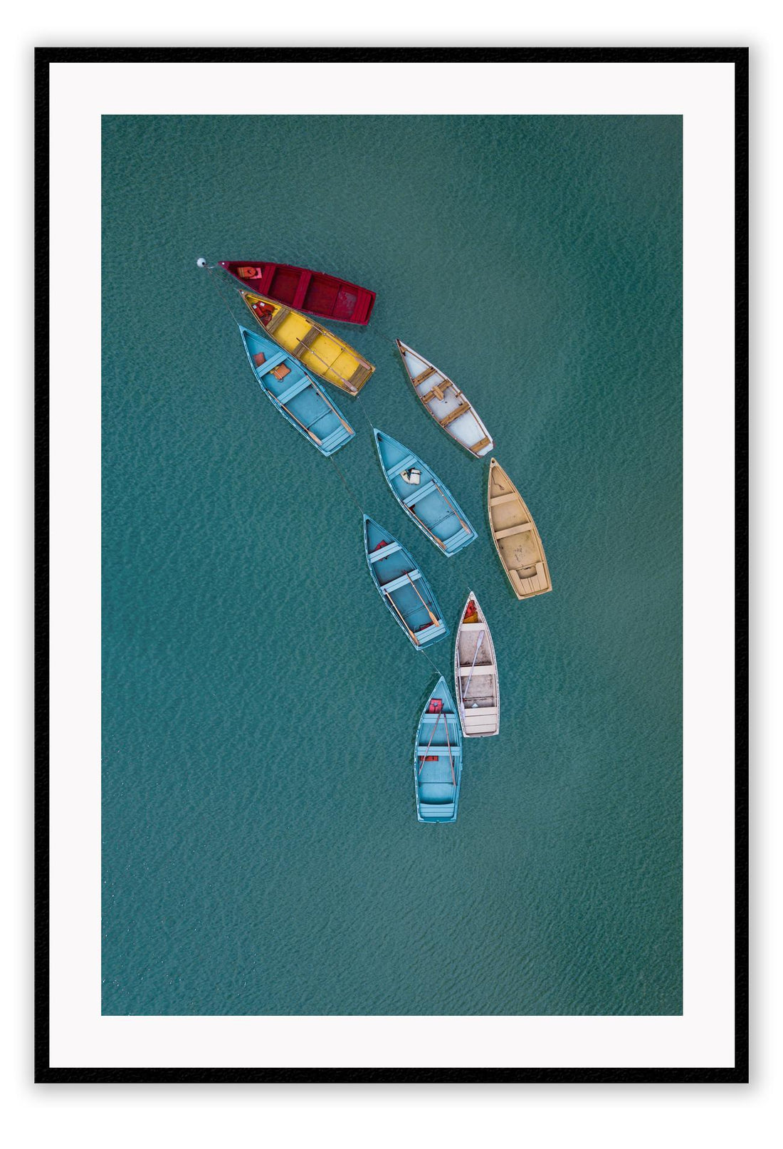 Blue ocean boats on water colourful red yellow beige white in line